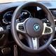 A photo of the steering wheel and dash in the BMW 330e.